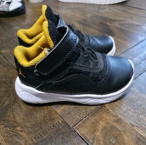 Jordans Black and Yellow High Tops